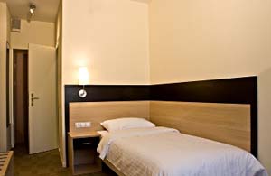 Standard single with private facilities, and breakfast